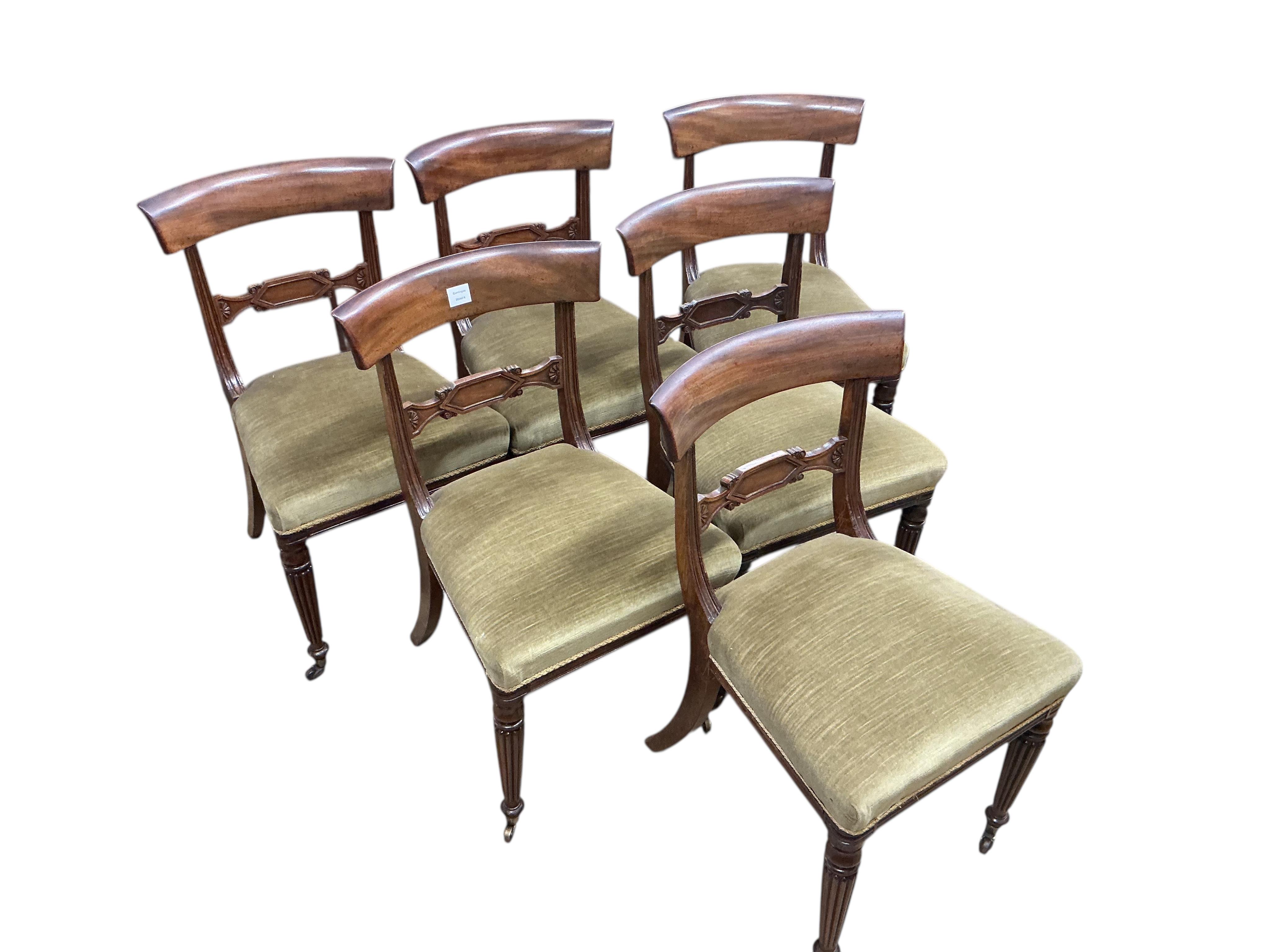 A set of six Regency mahogany bar back dining chairs on fluted legs